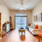Show photo 112: An apartment living room at The Terraces at Kingwood