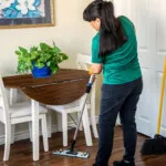 Show photo 67: Housekeeping tidying a residence