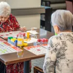Show photo 103: Residents playing bingo