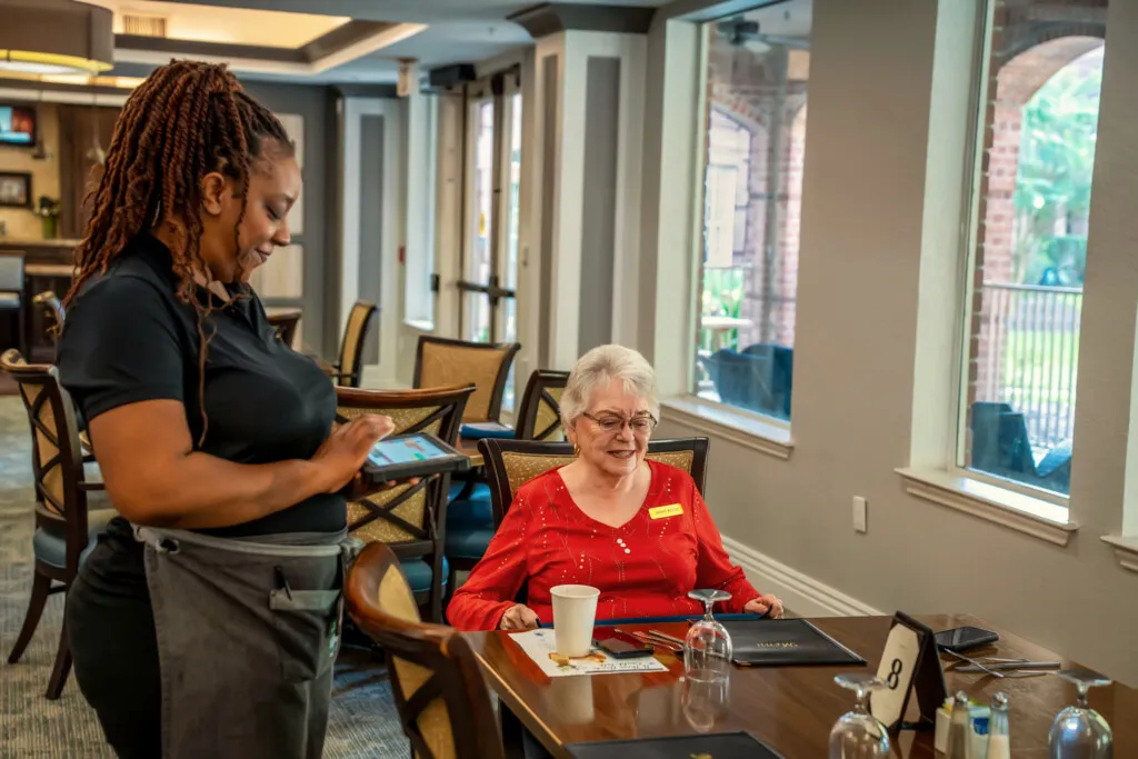 A server taking orders at lunch