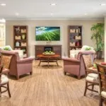 Show photo 14: Lounge fireplace at Tarina of Cypresswood
