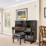 Show photo 25: Piano by window at Tarina of Cypresswood