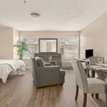 Show photo 29: Furnished residence with a bed, sitting chair and dining table at Tarina of Cypresswood