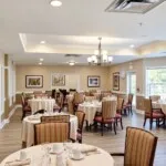 Show photo 8: Dining room round tables at Tarina of Kingwood