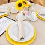 Show photo 13: Dining table setting at Tarina of Kingwood