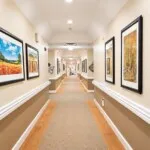 Show photo 15: Hallway artwork at Tarina of Kingwood