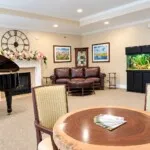 Show photo 16: Living room piano aquarium at Tarina of Kingwood