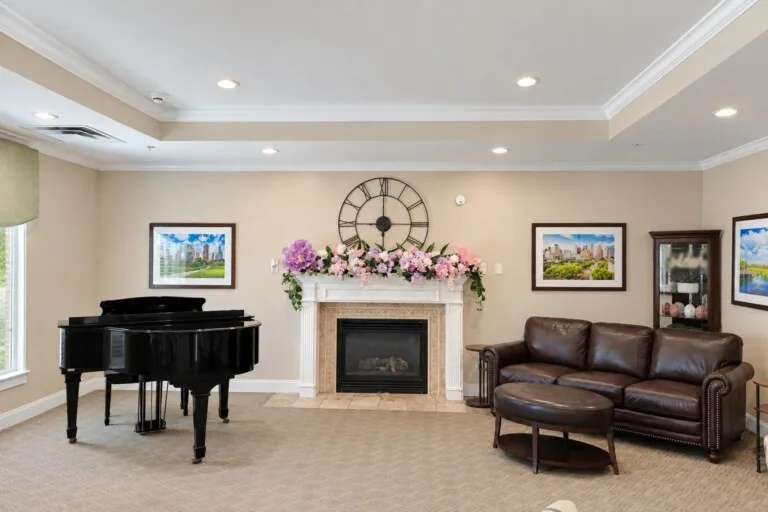 Living room piano fireplace at Tarina of Kingwood