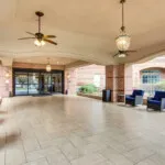 Show photo 10: The covered entry lounge at The Terraces at Kingwood