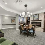Show photo 60: Fireside lounge library at The Terraces at Kingwood